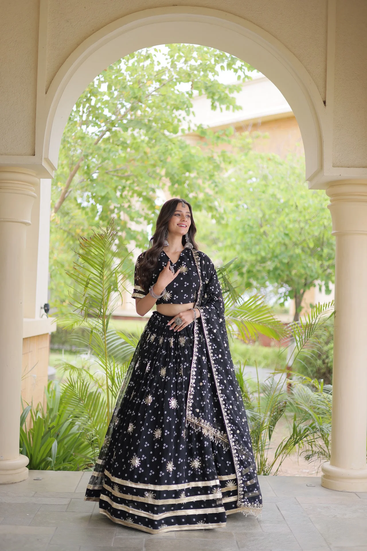 Women's Faux Georgette Bandhej Print Lehenga Choli with Dupatta in Black