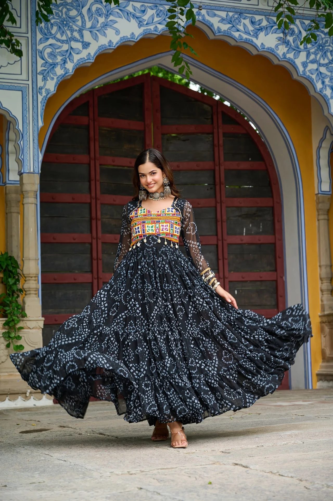 Women's Faux Georgette Bandhani Print Gown with Kutchi Patchwork in Black