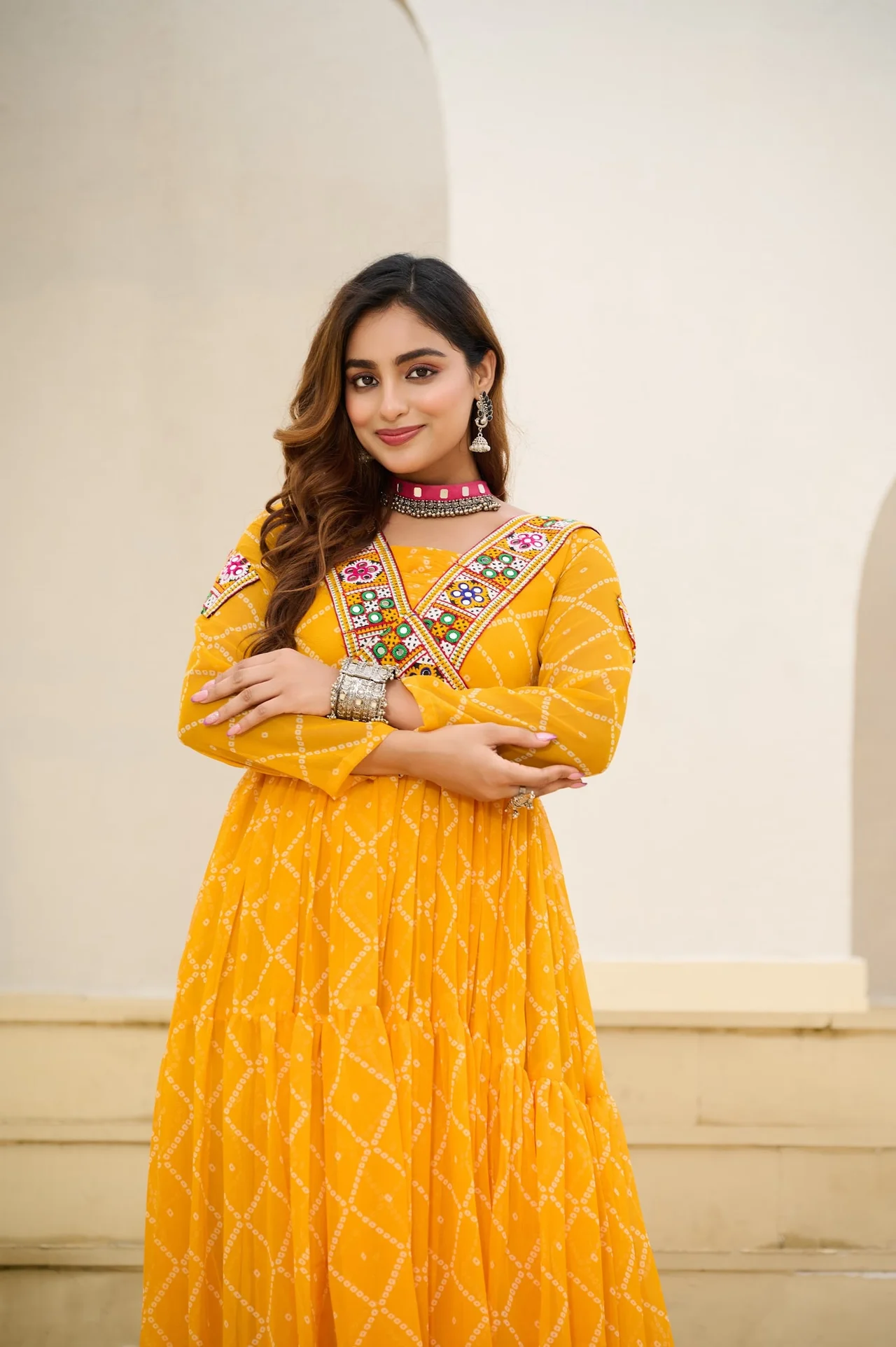 Women's Faux Georgette Bandhani Print Gown with Kutchi Patchwork in Mustard