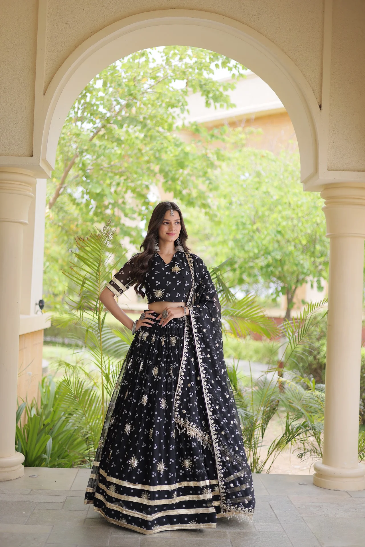 Women's Faux Georgette Bandhej Print Lehenga Choli with Dupatta in Black — photo 2 of 8