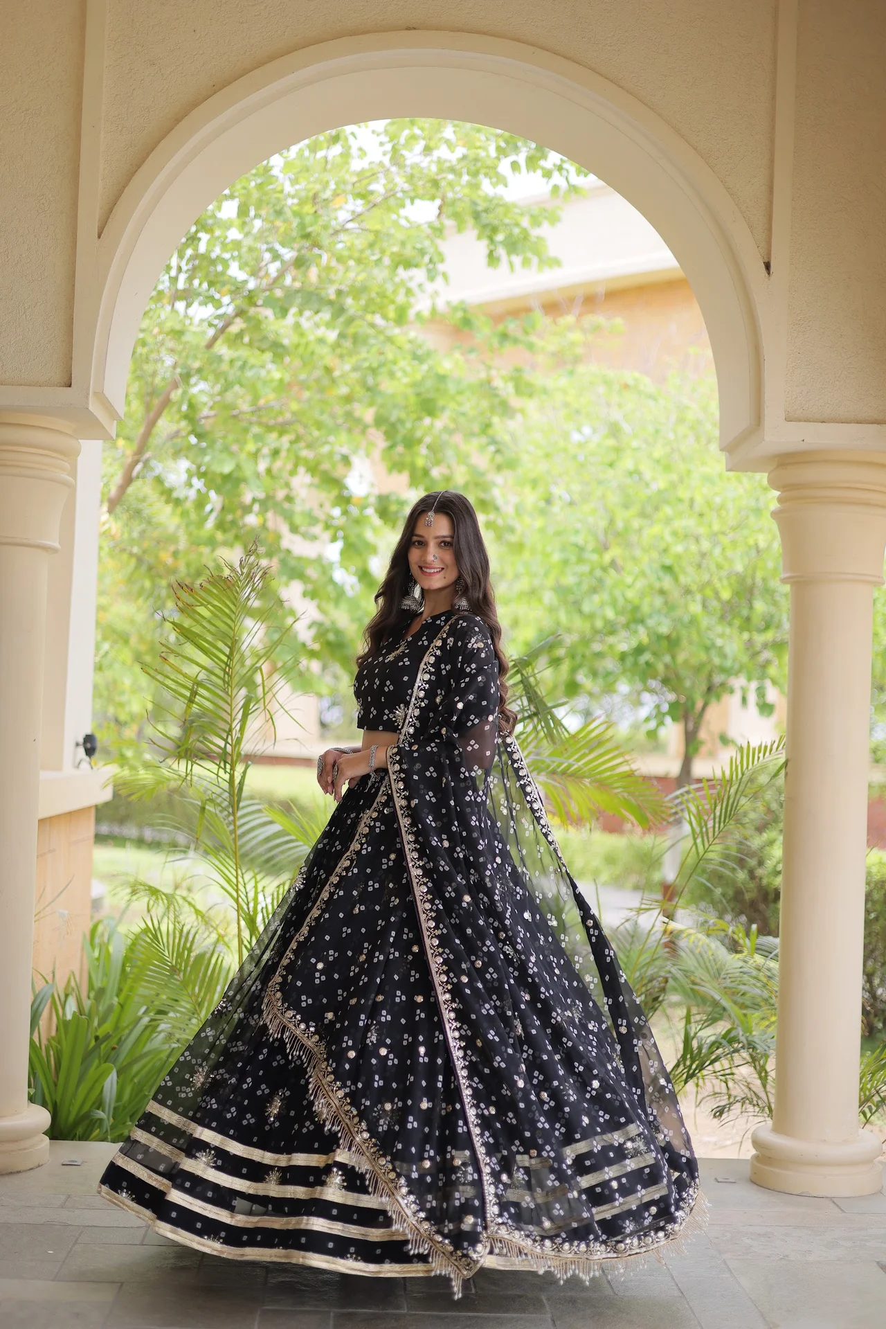 Women's Faux Georgette Bandhej Print Lehenga Choli with Dupatta in Black — photo 4 of 8