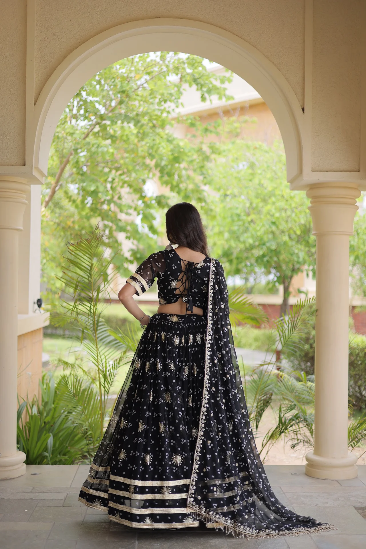 Women's Faux Georgette Bandhej Print Lehenga Choli with Dupatta in Black — photo 5 of 8