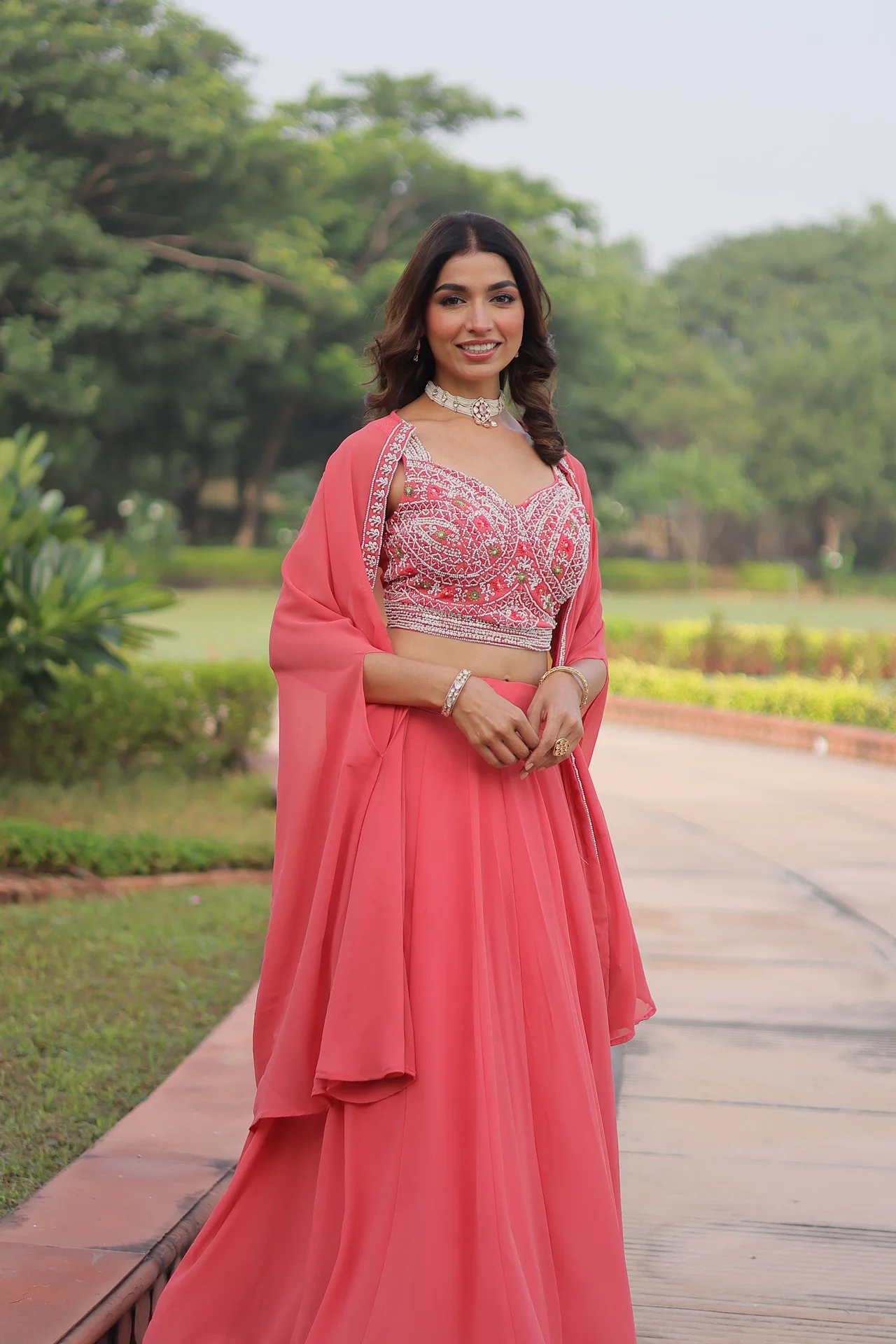 Women's Faux Georgette Lehenga Choli with Embroidered Shrug in Coral — photo 2 of 10