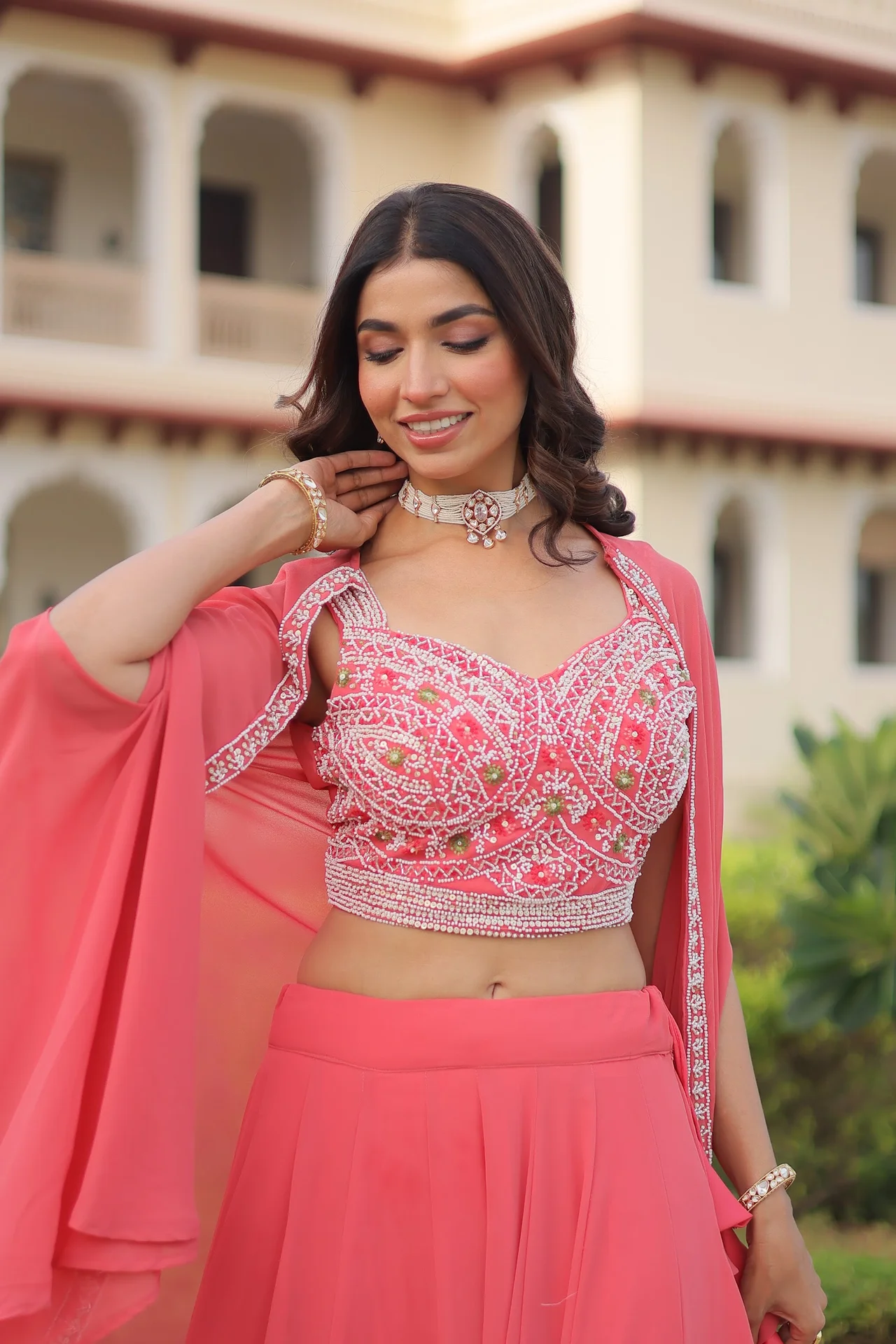 Women's Faux Georgette Lehenga Choli with Embroidered Shrug in Coral — photo 7 of 10