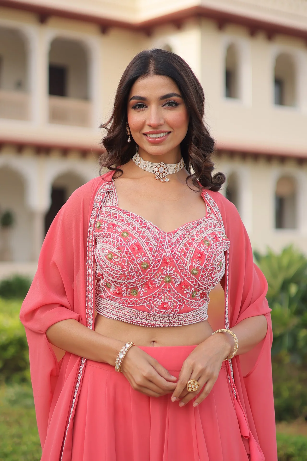 Women's Faux Georgette Lehenga Choli with Embroidered Shrug in Coral — photo 8 of 10
