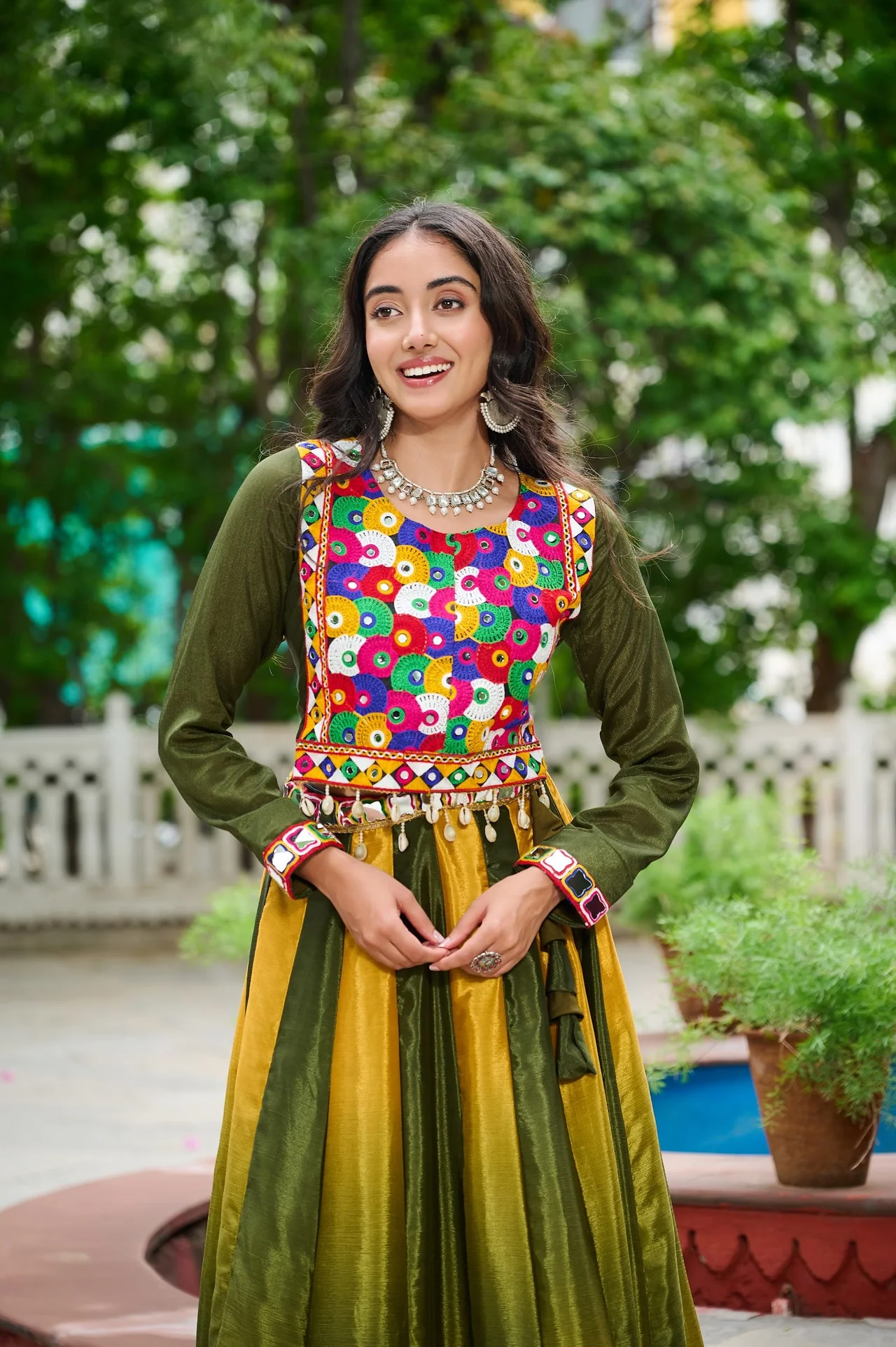 Women's Chinnon Navratri Lehenga Choli with Kutchi Gamthi Embroidery in Mehendi Green — photo 2 of 6