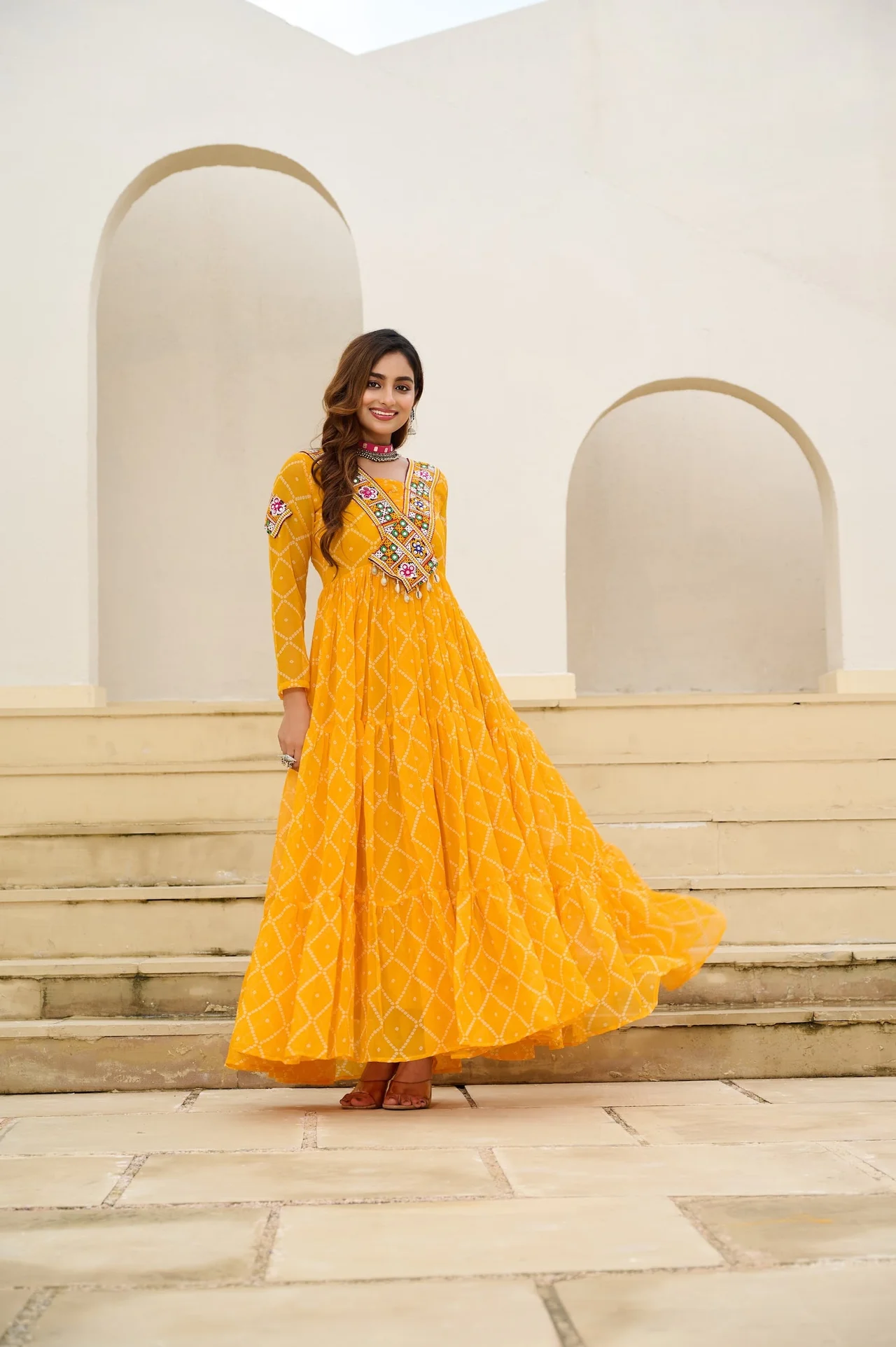 Women's Faux Georgette Bandhani Print Gown with Kutchi Patchwork in Mustard — photo 2 of 4