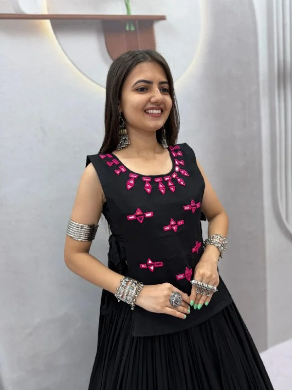 Vidala Clothings Navratri Special Rayon Cotton Lehenga Choli with 6 Meter flair, fully stitched choli with cups and real mirror work handwork jacket. in Black — photo 2 of 6
